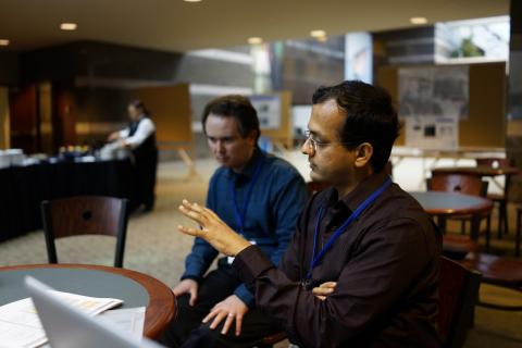 Ajinkya Kulkarni discusses Drupal with colleagues
